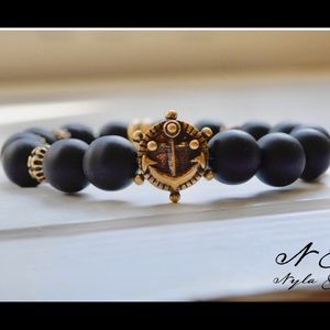 Stretch band marble bracelet, NWT. Antique brass